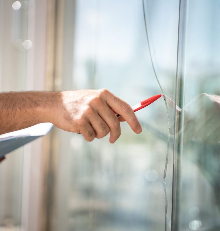 glass-broken-from-house-by-accident-man-checking-repair (1)